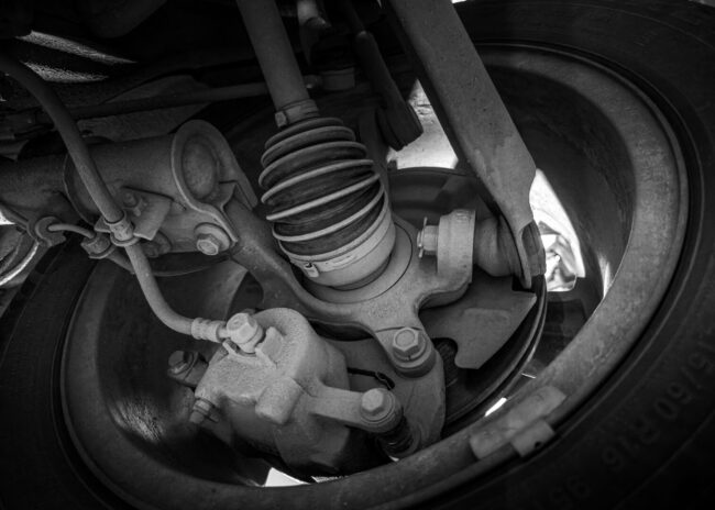 Monochrome close up view of a vehicle suspension